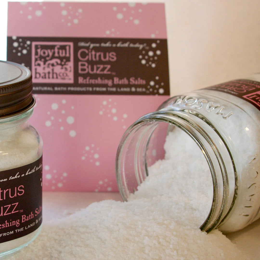 Citrus Buzz Refreshing Bath Salts on the table