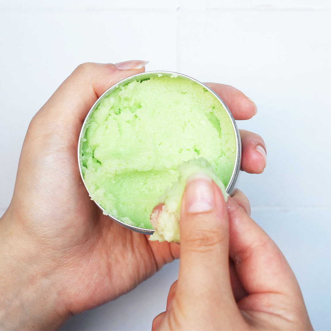 Cucumber Mint Body Scrub pinching with finger tips
