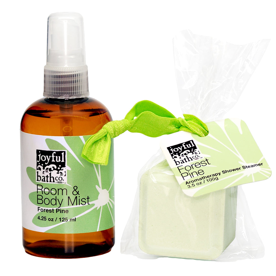 an unwrapped combination of Room and Body Mist and Shower Steamer in the scent of Forest Pine