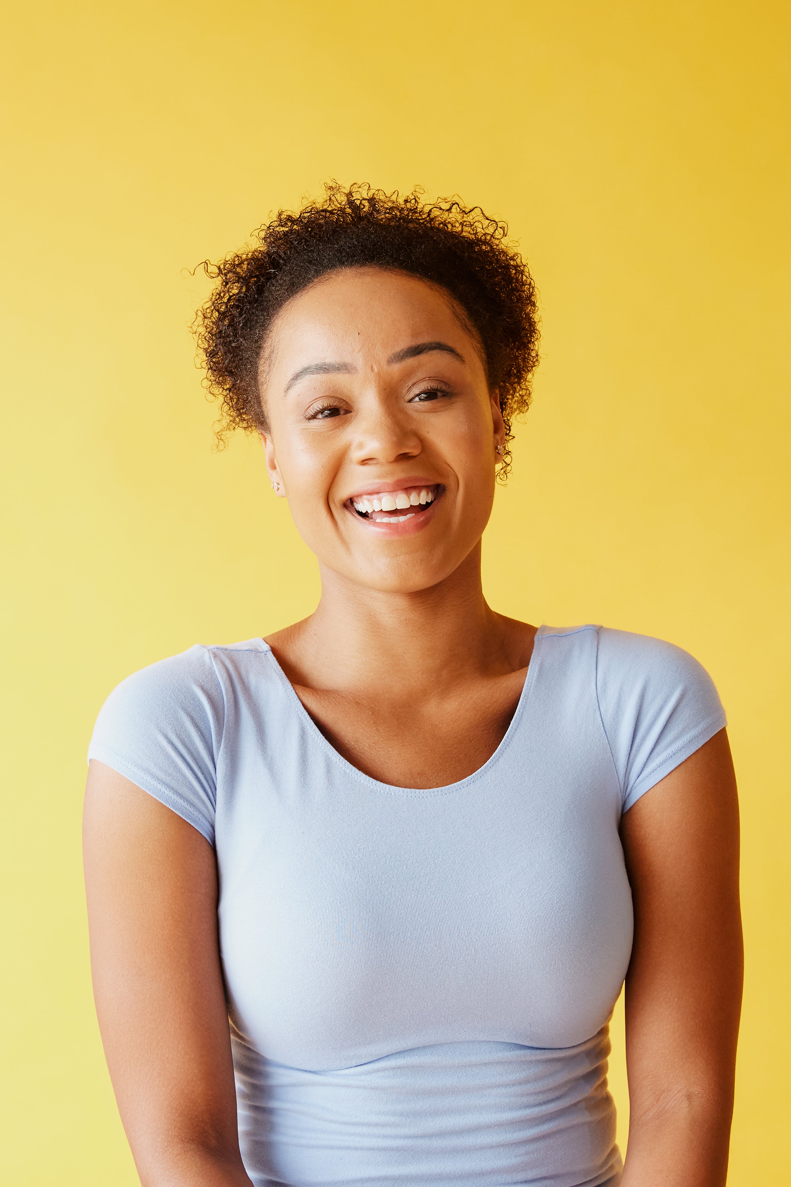 woman dressed in purple smiling