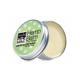 An open tin of Hemp Balm on a white background