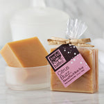 Citrus Buzz Natural Face and Body Soap in glass soap dish