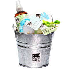 Shower Oasis Gift Set in Herbal with its contents inside a small galvanized bucket