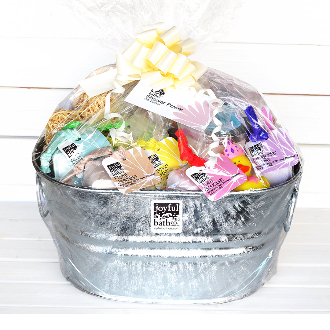 Shower Power Gift Bucket all wrapped up with a pretty white bow