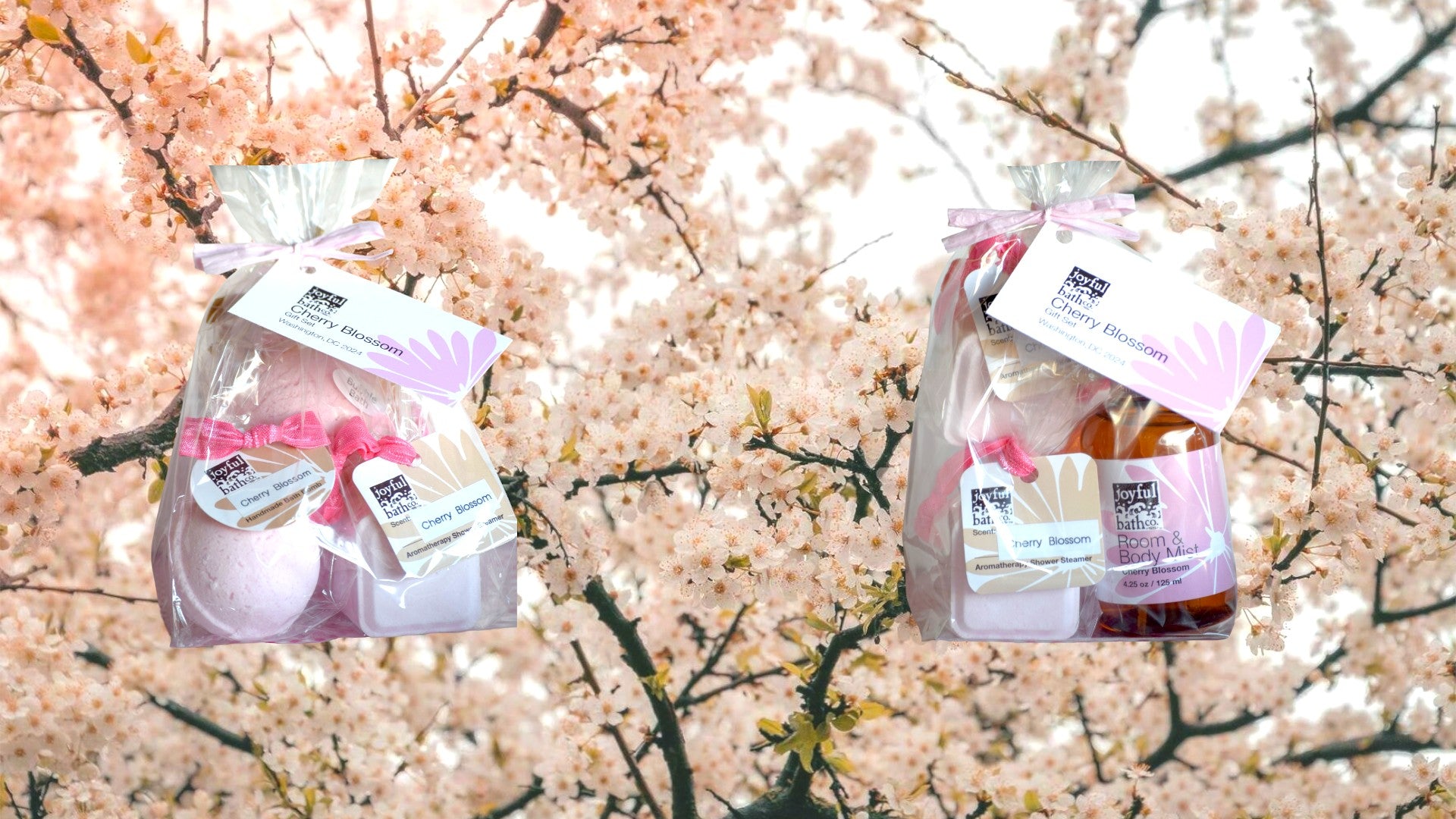 two cherry blossom souvenir bath and shower sets on a cherry blossom background